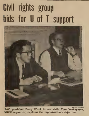 A story from the cover page of December 11, 1963 issue of The Varsity newspaper. The title of the article reads "Civil rights group bids for U of T support." Underneath is a black and white image of Tom Wakayama sitting beside Doug Ward. The caption below reads "SAC president Doug Ward listens while Tom Wakayama, SNCC organizer, explains the organizations objectives.